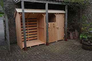 Storage for logs, wheelie bin and recycling boxes.JPG